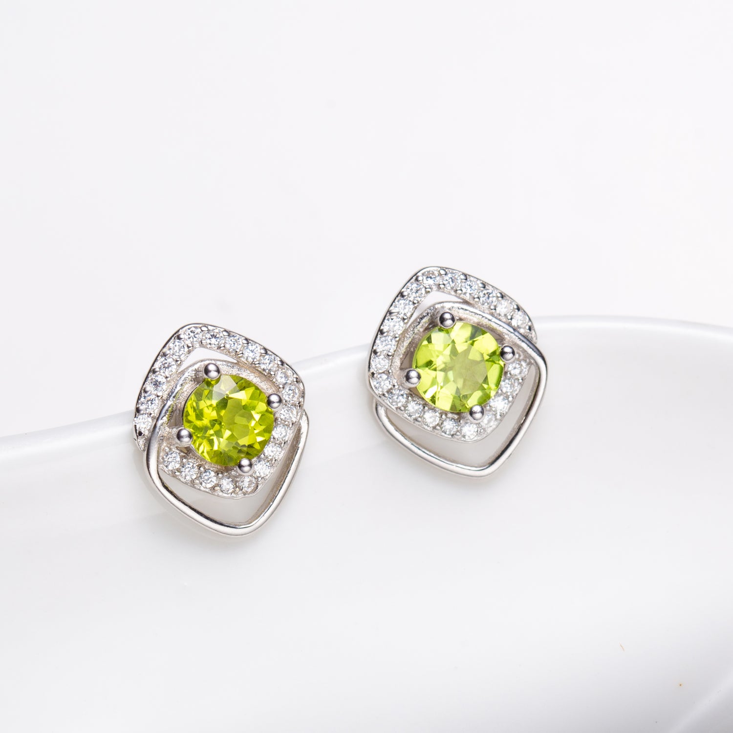 Natural Peridot Rhodium Over Sterling Silver Stud Earrings
