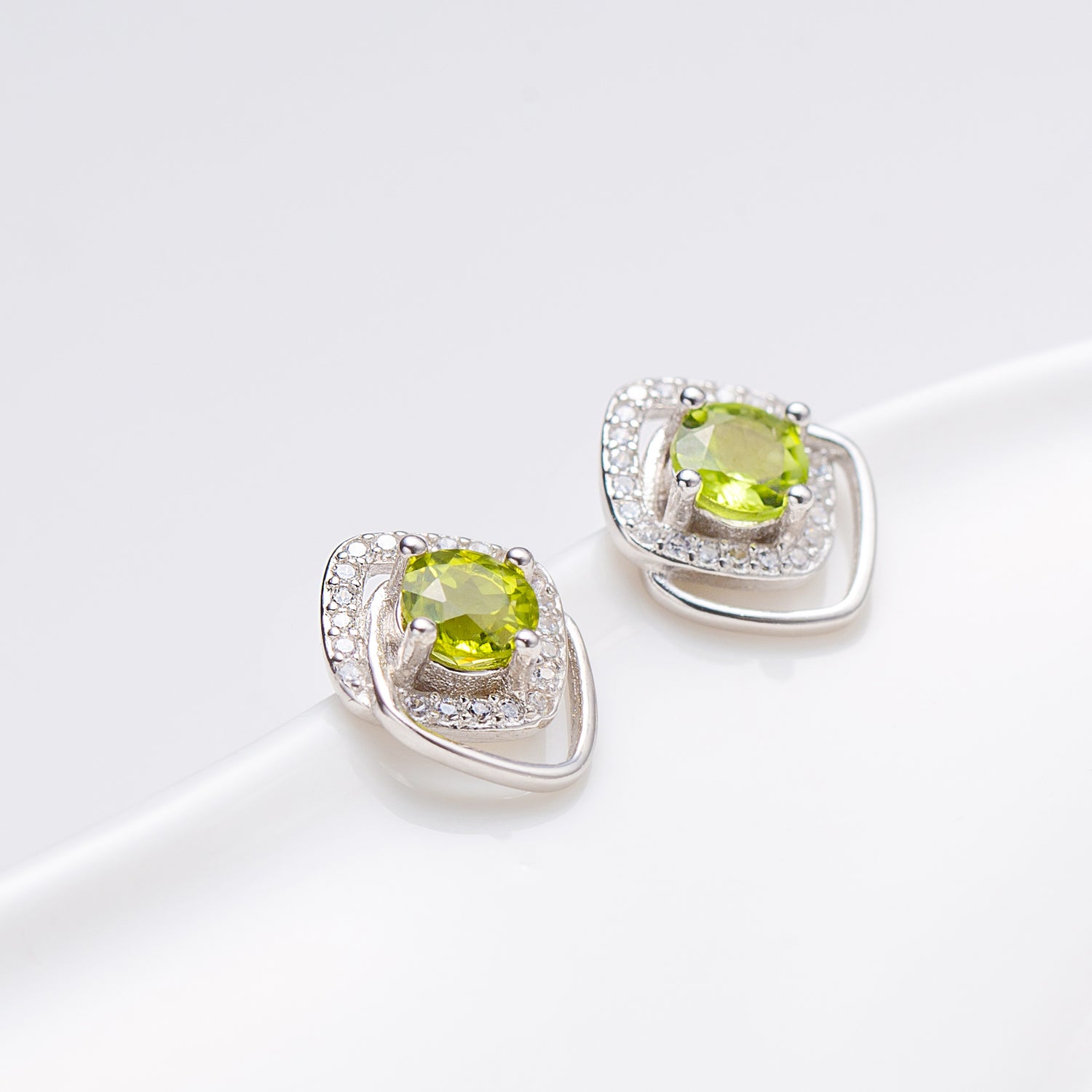 Natural Peridot Rhodium Over Sterling Silver Stud Earrings