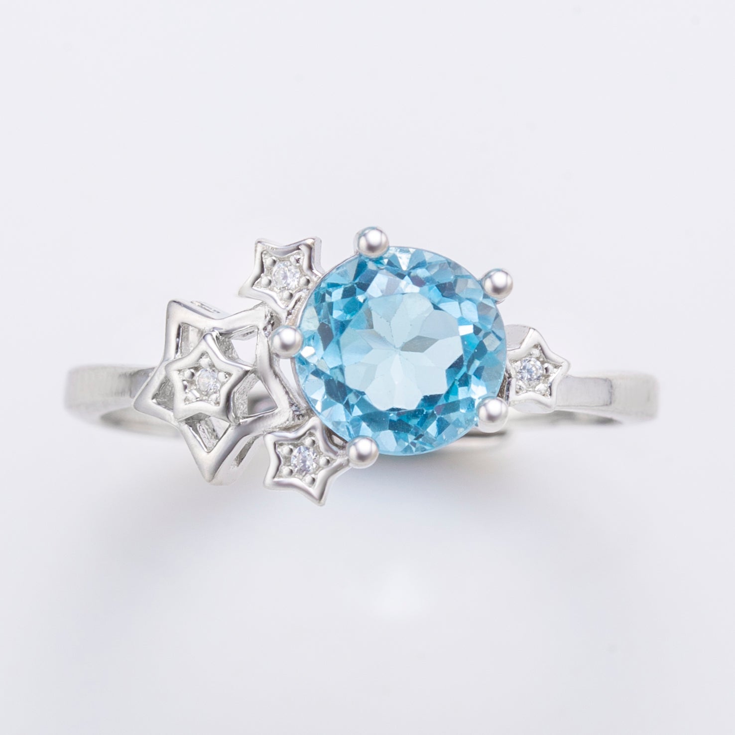 Natural Round Sky Blue Topaz Sterling Silver Star Ring