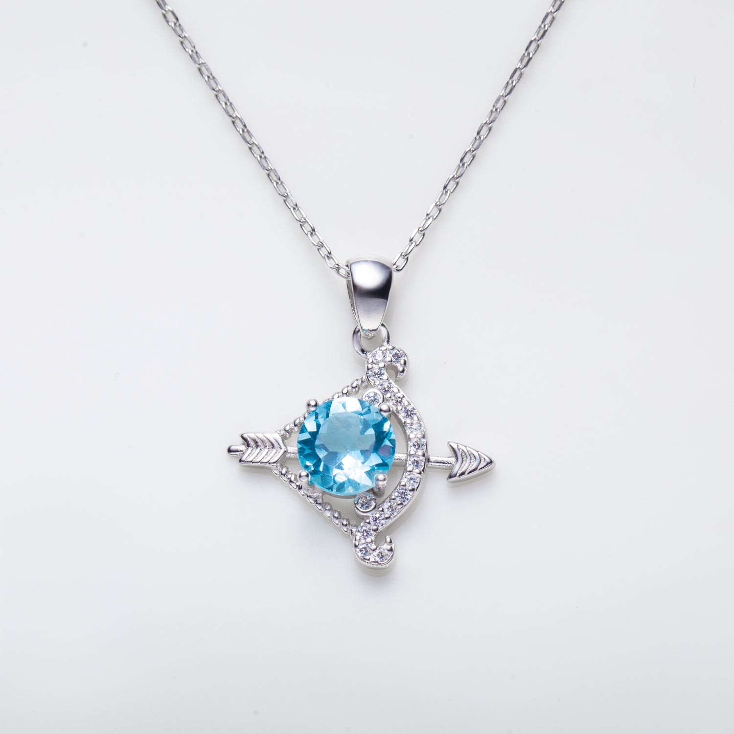 Sparkling Sky Blue Topaz Bow and Arrow Sterling Silver Necklace