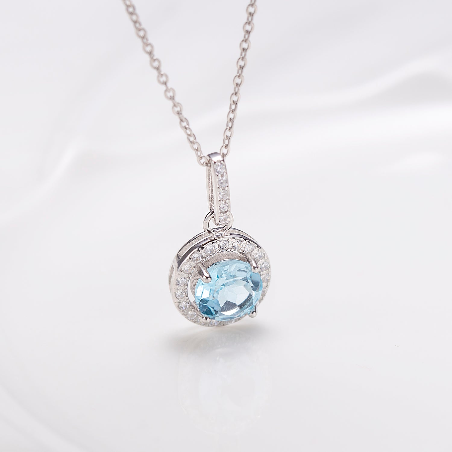 Round Halo Sky Blue Topaz Sterling Silver Pendant Necklace